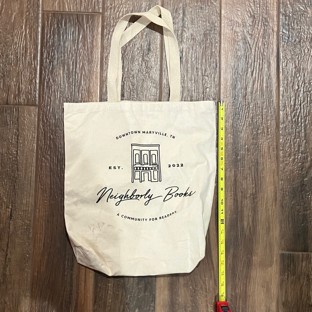 Beige Neighborly Books Tote Bag